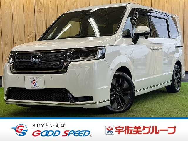 ホンダステップワゴンｅ：ＨＥＶスパーダ　両側電動スライドドア／ホンダセンシング／クリアランスソナー／後席エアコン／シートヒーター／電動リアゲート／パドルシフト／スマートキー／プッシュスタート／ブラインドスポットモニター／ＣＤ・ＤＶＤ再生
