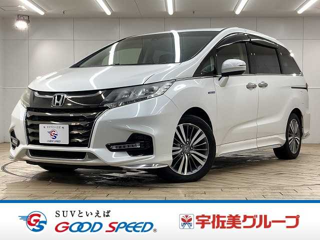 ホンダオデッセイハイブリッドアブソルート・ホンダセンシング　後期型／７人／純正ナビＴＶ／両側電動スライドドア／レーダークルーズコントロール／衝突軽減ブレーキ／オートエアコン／ＬＥＤヘッドライト／バックカメラ／ＥＴＣ／オットマン／Ｂｌｕｅｔｏｏｔｈ再生