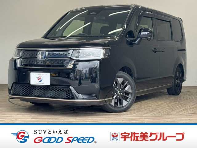 ホンダステップワゴンスパーダ　純正１１．４インチナビ／二列目キャプテンシート／電動リアゲート／両側電動スライドドア／レーダークルーズコントロール／ハーフレザーシート／バックカメラ／コーナーセンサー／ＵＳＢ入力端子／シートヒーター